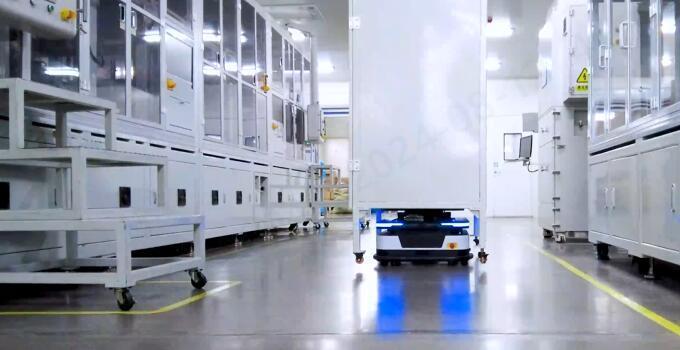 Robot tải/gỡ máy tráng phủ